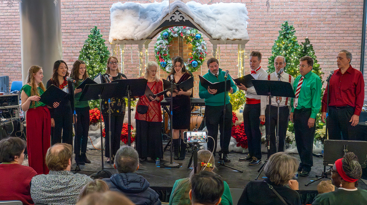 Singers perform at the 2023 APL Winter Reception