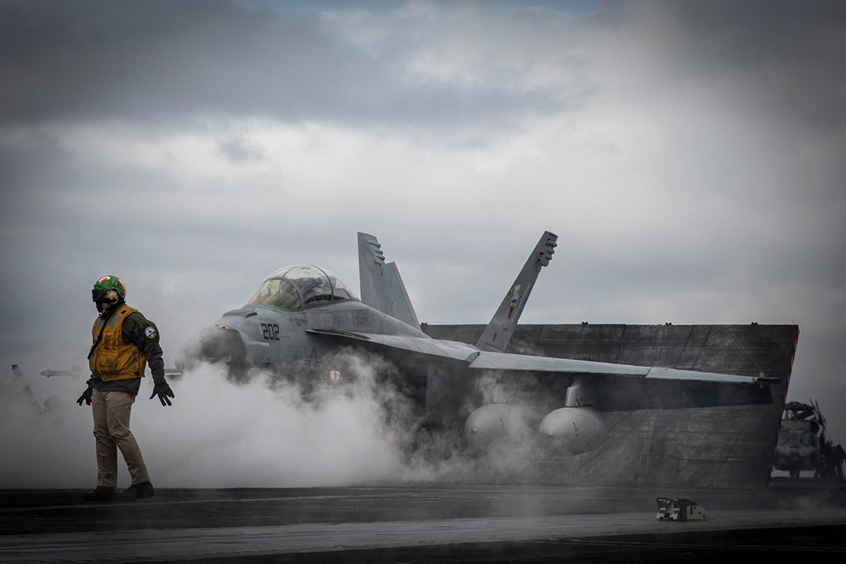 An F/A-18F Super Hornet aircraft prepares to launch from the flight deck of the Nimitz-class aircraft carrier USS George H.W. Bush (CVN 77). (Credit: U.S. Navy/Petty Officer 2nd Class Brandon Roberson)