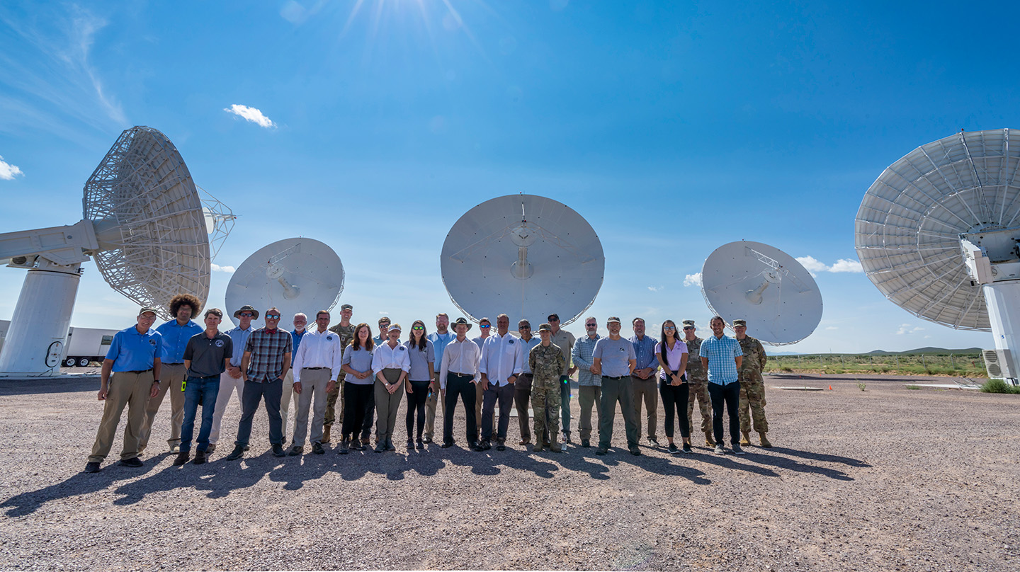 Engineers from Johns Hopkins APL in Laurel, Maryland, and their industry and government partners stand proudly in front of the Deep Space Advanced Radar Concept (DARC) in White Sands Missile Range, New Mexico