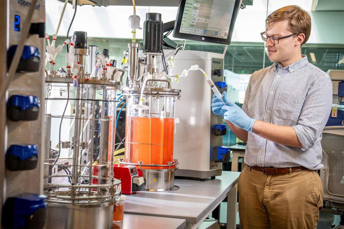 Will Stone, a molecular biologist, experiments in APL’s biomanufacturing lab.