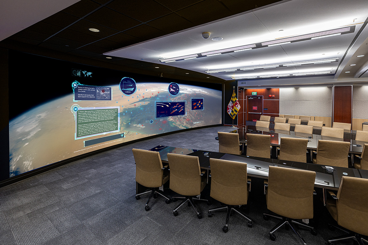 Composite image of APL's Collaborative Analysis Center with the GenWar display
