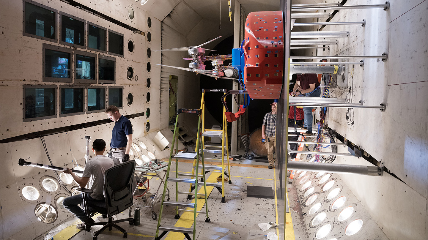 Charles Pheng, Ryan Miller, John Kayrouz, Kristen Carey, and Josie Ward prepare for the first aeromechanical performance tests of the full-scale Dragonfly rotors in the Transonic Dynamics Tunnel at NASA’s Langley Research Center