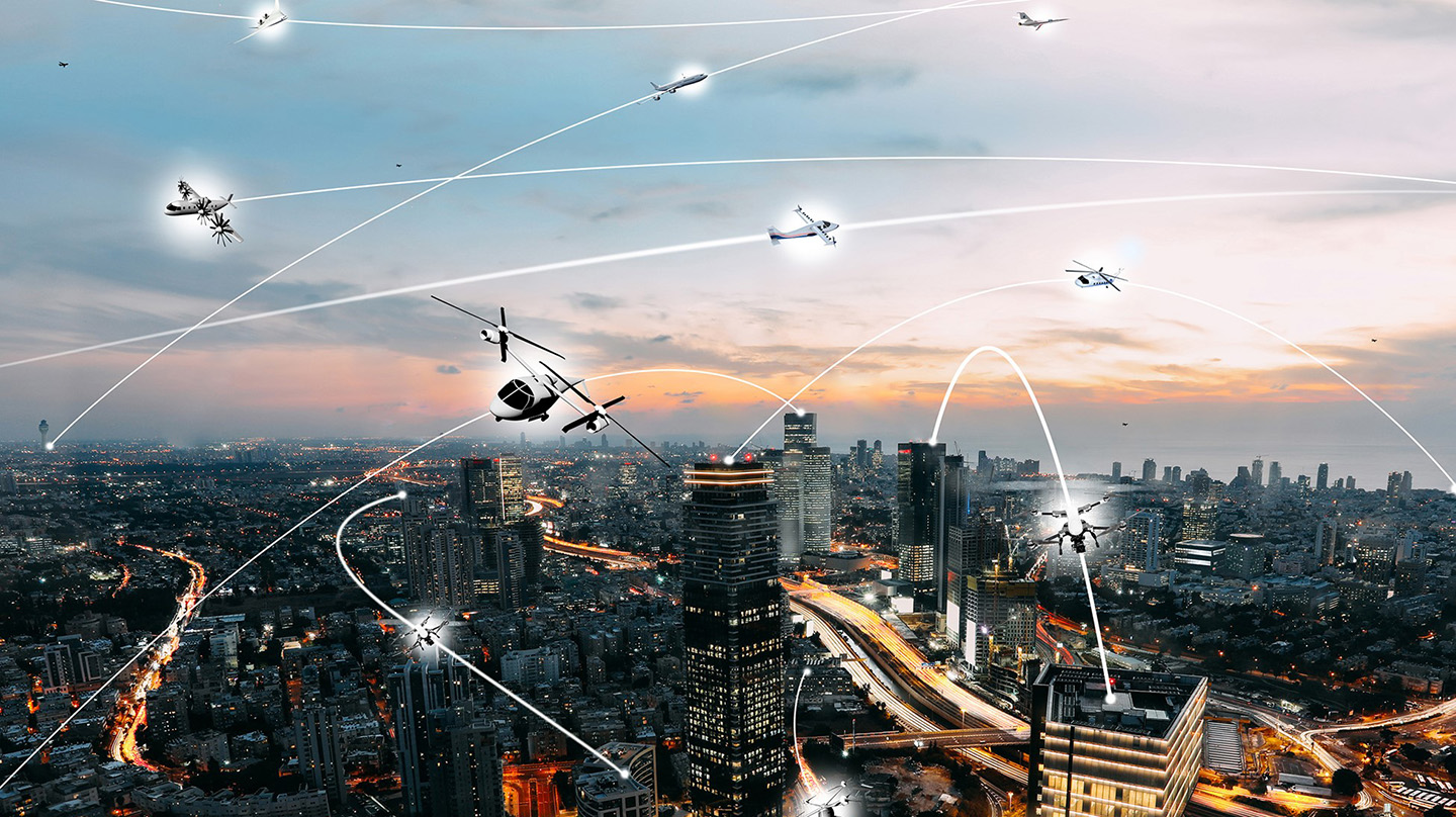 An artist’s rendering of an urban air mobility environment, where manned and unmanned aircraft of different types share the skies safely and efficiently. (Credit: NASA)