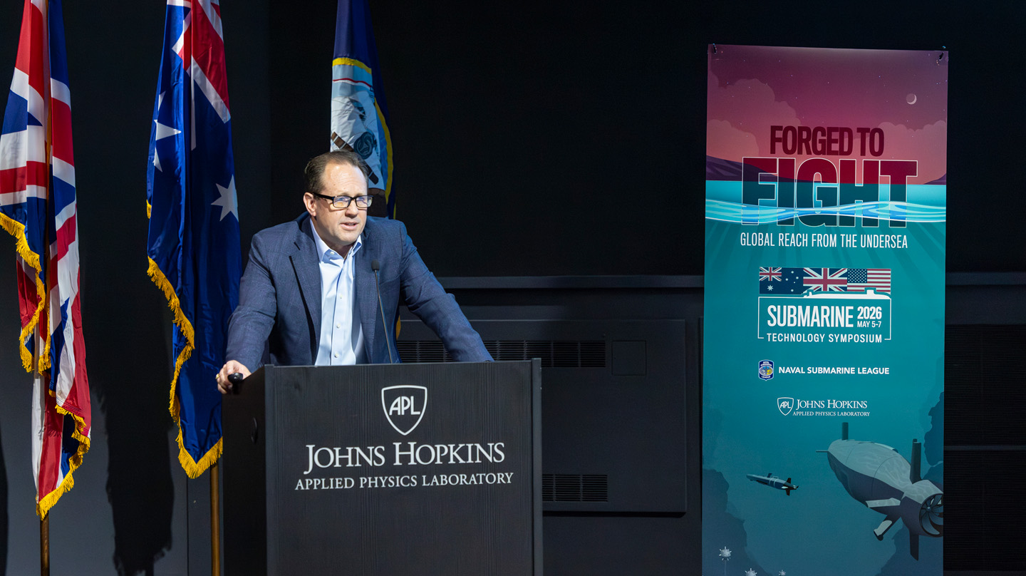 Christopher Watkins, Submarine Technology Symposium co-chair, welcomes attendees to the annual conference.