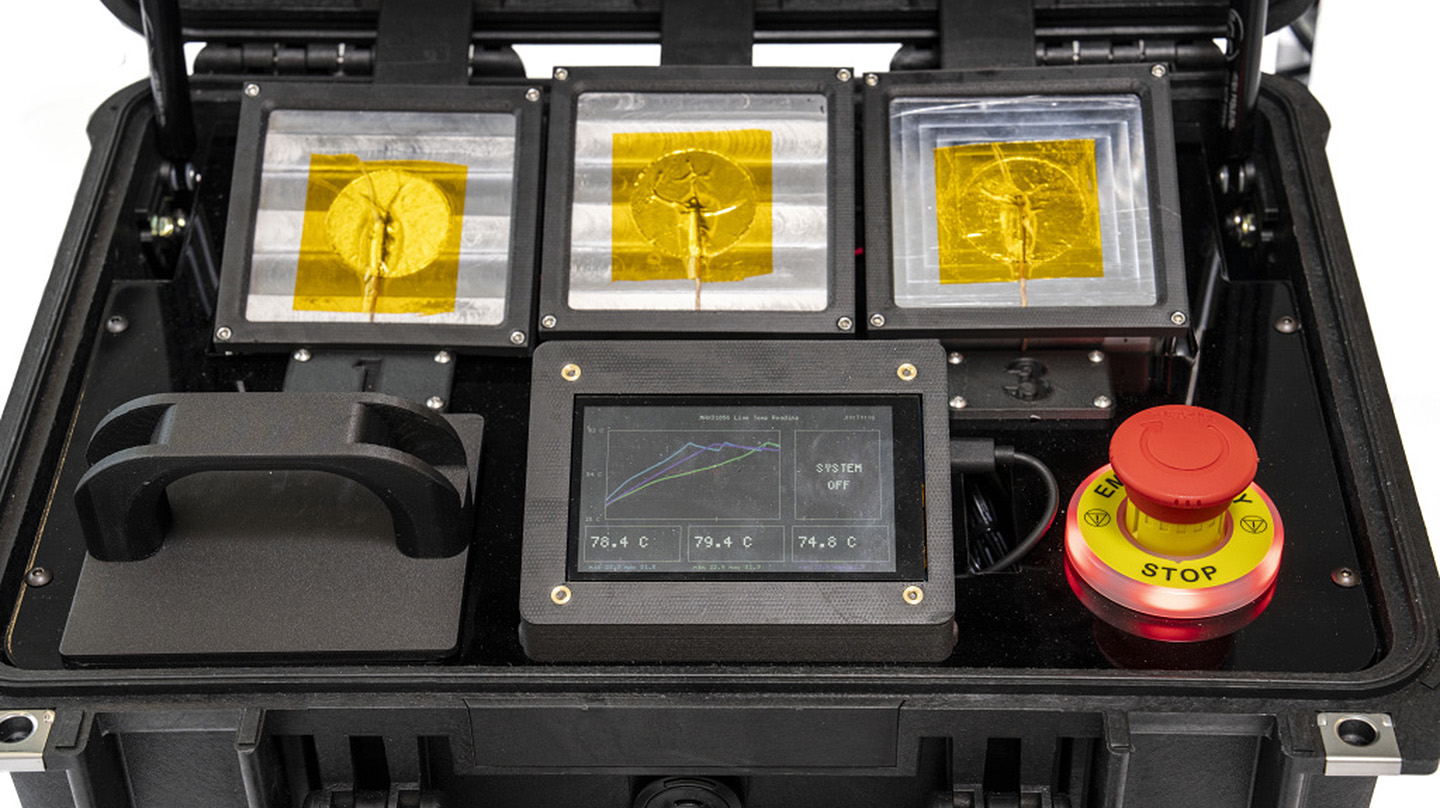 The demo unit, built in a retrofitted Pelican case, provides a visual comparison of SPEAR heatsinks