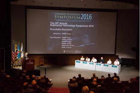 Rear Adm. Charlie Young (USN, Ret.) moderating a roundtable discussion