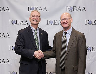 APL’s Chuck Alexander (left) with ICEAA International President Paul Marston