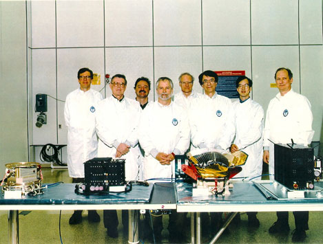 Lead investigators pose with the sensors of the Magnetospheric Imaging Instrument at APL