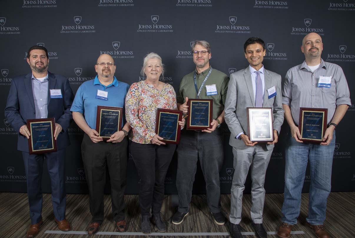 From left to right are Larry Loza, Eric M. Kessler, Patricia L. Miller, Thomas C. Gump, Jigar R. Amroliwala and Adam K. VanderHook. 