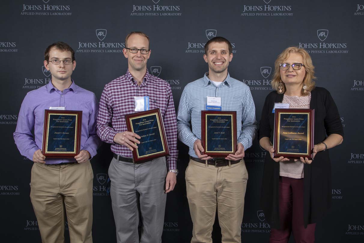 From left to right are Daniel S. Berman, Nathan H. Parrish, Jared T. Zook and Anna Loskiewicz-Buczak