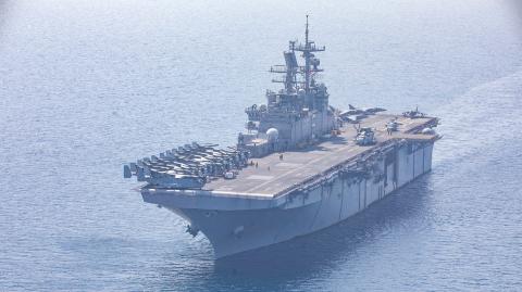 The amphibious assault ship USS Bataan (LHD 5) sails in the Arabian Gulf